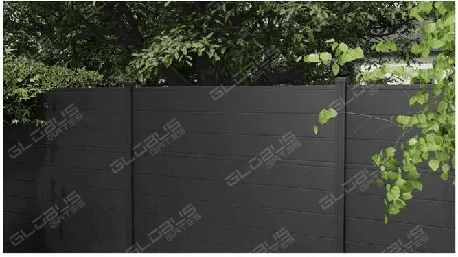 Black aluminum fence contrasted against greenery, highlighting durability and aesthetic appeal over PVC